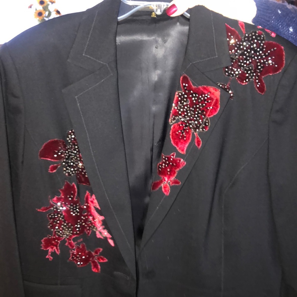 Black coat with red flowers